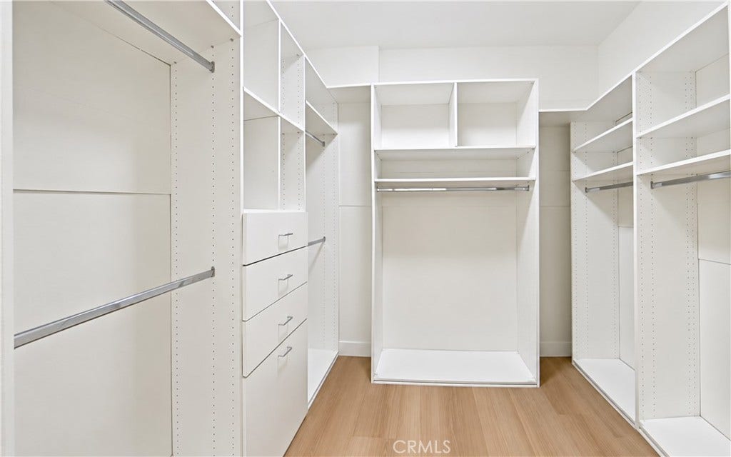 walk-in closet in master bedroom
