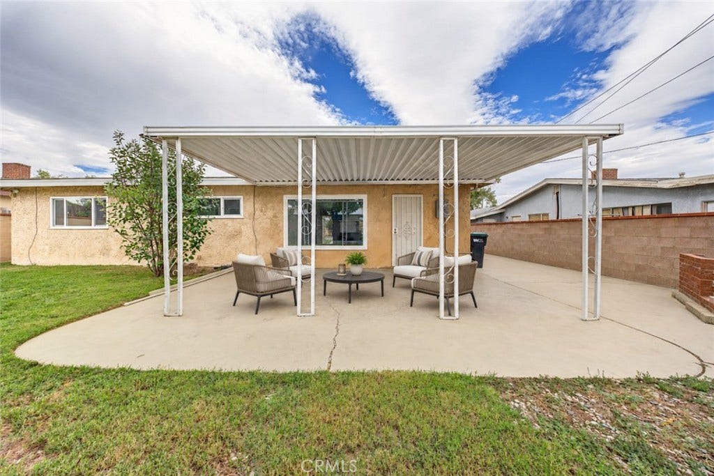 44650 2nd Street E, Lancaster, CA 93535 Ample backyard perfect for family gatherings. Patio Cover perfect to shade you from the elements.
