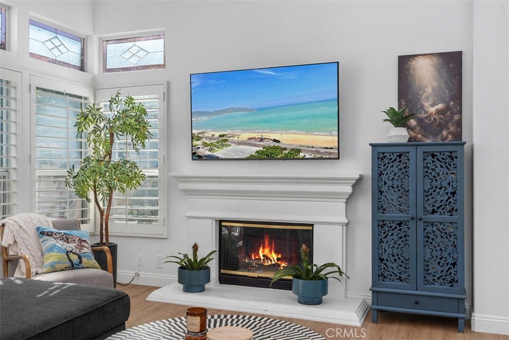 21121 Cancun, Mission Viejo, CA 92692 Luxurious Open Living Room. W/ Fireplace. Plantation Shutters