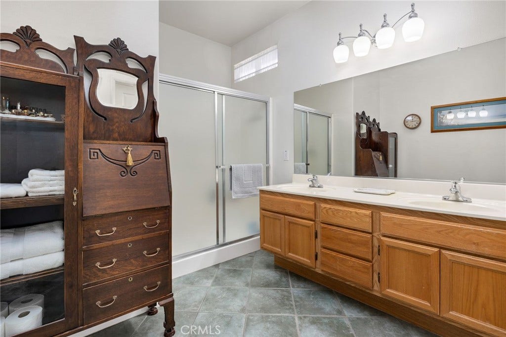 853 Camino De Oro, San Jacinto, CA 92583 main bathroom, with walk in shower and double sinks