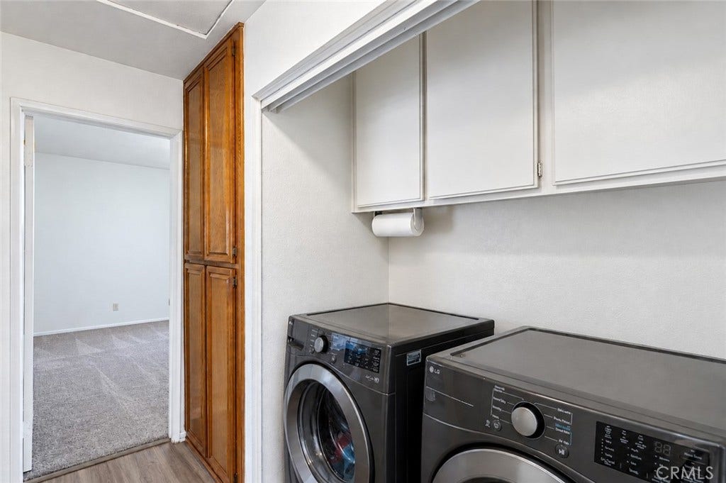 Inside Laundry. Washer and Dryer can convey