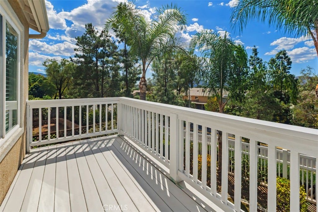 Your spacious primary retreat makes the most of indoor-outdoor living