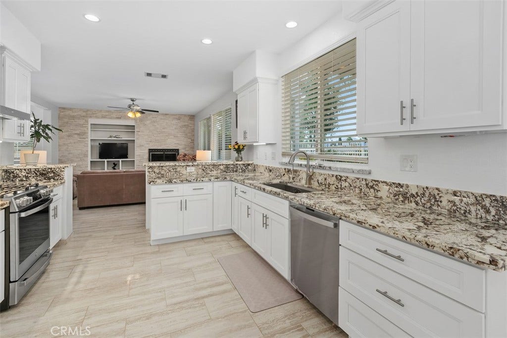 The tastefully upgraded light, bright kitchen hits the right notes with its rich variety of textures