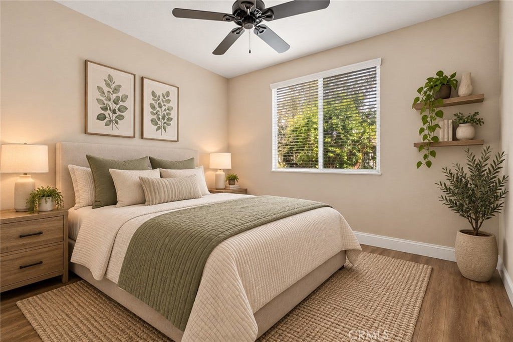 32440 Magenta Court, Temecula, CA 92592 Inviting Bedroom Featuring Wood-Look Flooring, A Ceiling Fan, Large Window Overlooking The Outdoors, And A Comfortable, Relaxing Atmosphere. Digitally Staged