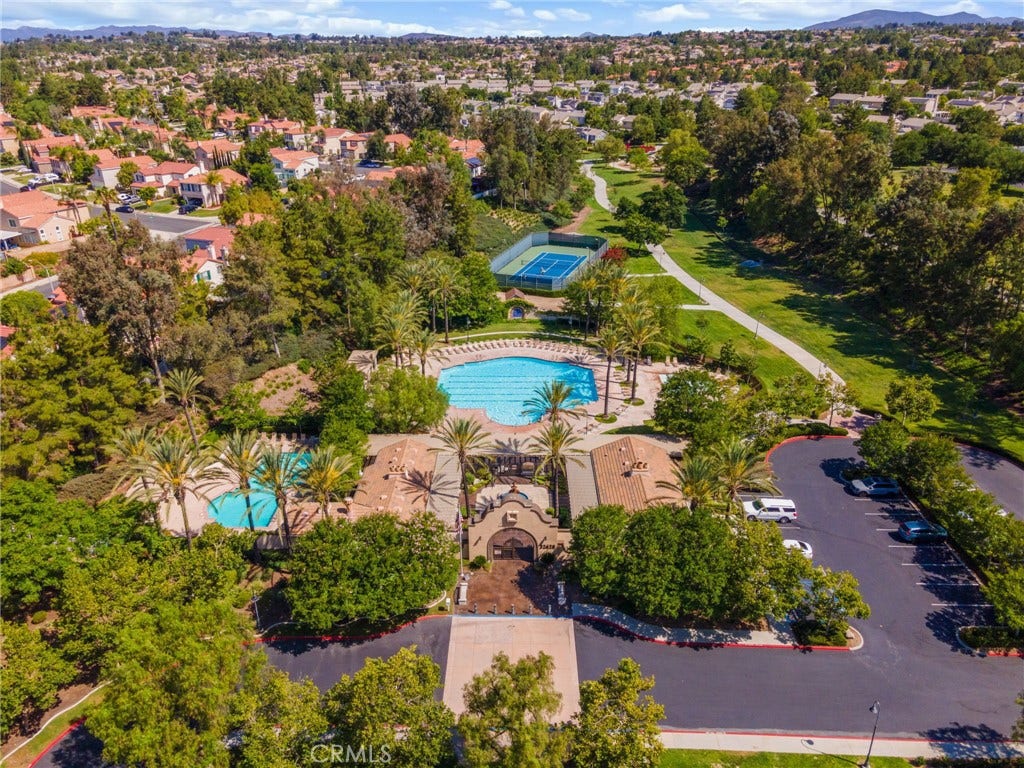 32440 Magenta Court, Temecula, CA 92592 Aerial View Of The Beautiful Paseo Del Sol Community Amenities Featuring Resort-Style Swimming Pools, Recreational Courts, Walking Trails, And Expansive Green Spaces.