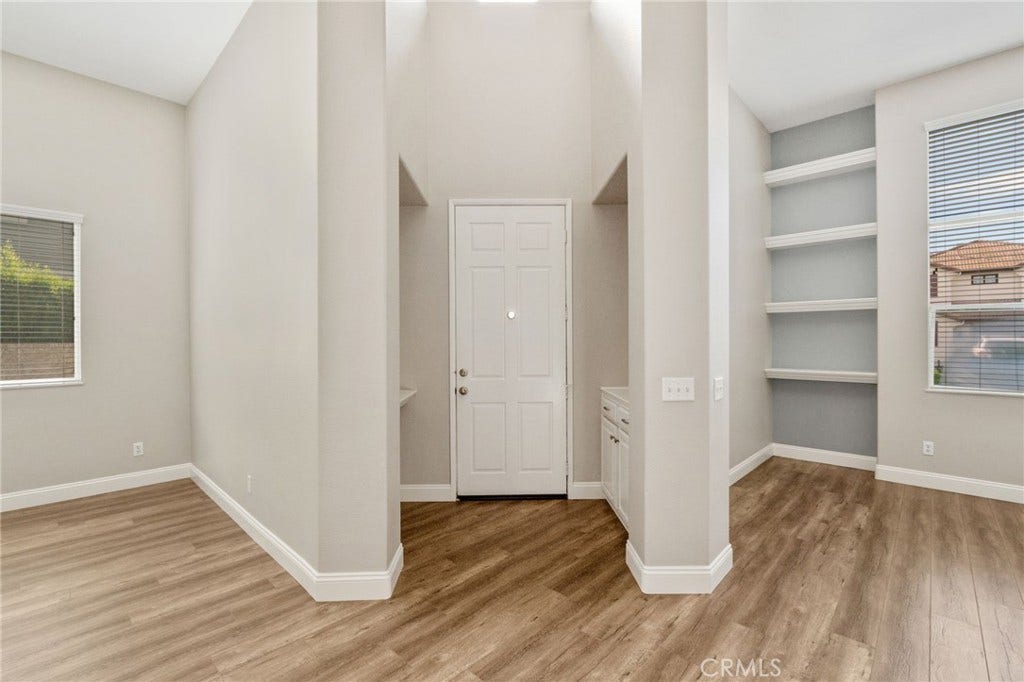 32440 Magenta Court, Temecula, CA 92592 Bright And Inviting Entryway Featuring Soaring Ceilings, Attractive Wood-Look Flooring, And An Open View Of The Versatile Front Living Spaces.