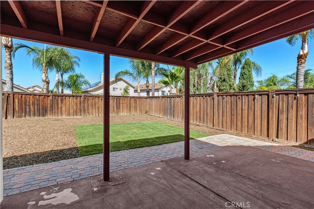42329 Via Consuelo, Temecula, CA 92592 Covered backyard patio offering a shaded outdoor space to relax, entertain, or enjoy the surrounding yard.