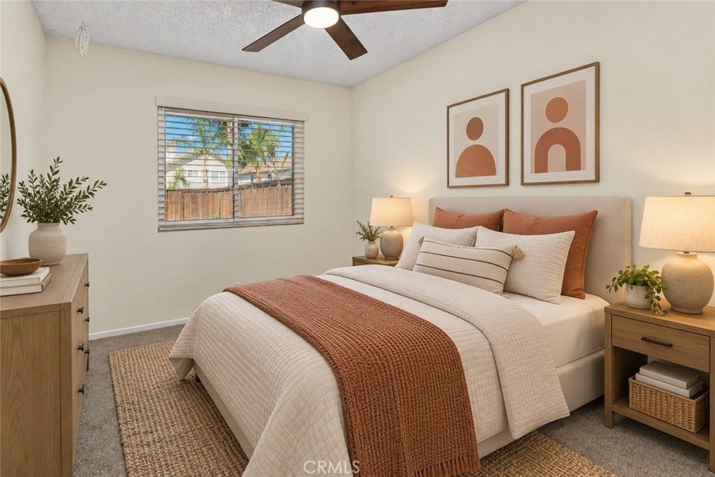 42329 Via Consuelo, Temecula, CA 92592 Another comfortable secondary bedroom featuring carpeted flooring, a ceiling fan, and natural light, with flexibility for guests, hobbies, or a home office. Digitally Staged