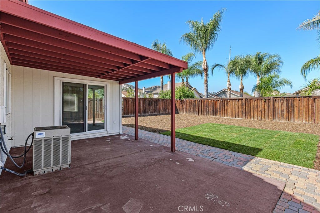 42329 Via Consuelo, Temecula, CA 92592 An additional view of the covered patio highlights the sliding glass doors, patio space, and convenient access to the backyard.