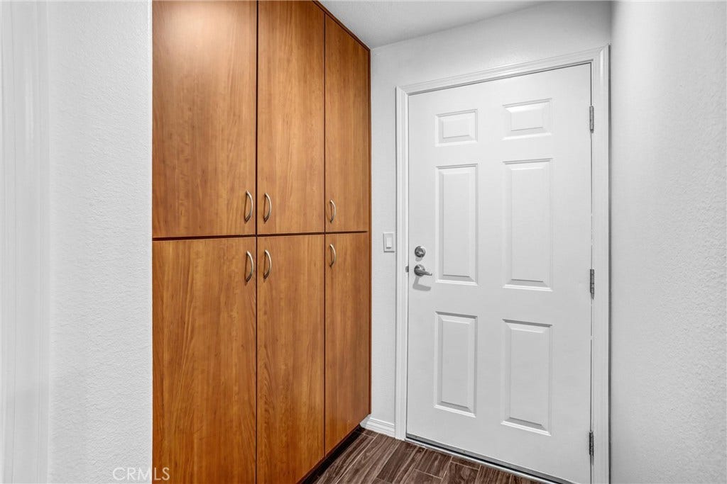 825 Francesca Drive, #103, Walnut, CA 91789 Hallway storage leading to the Garage