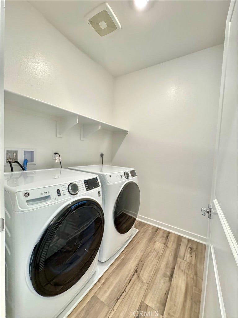 5826 Walden Ct, Eastvale, CA 92880 Laundry room-new washer and dryer included