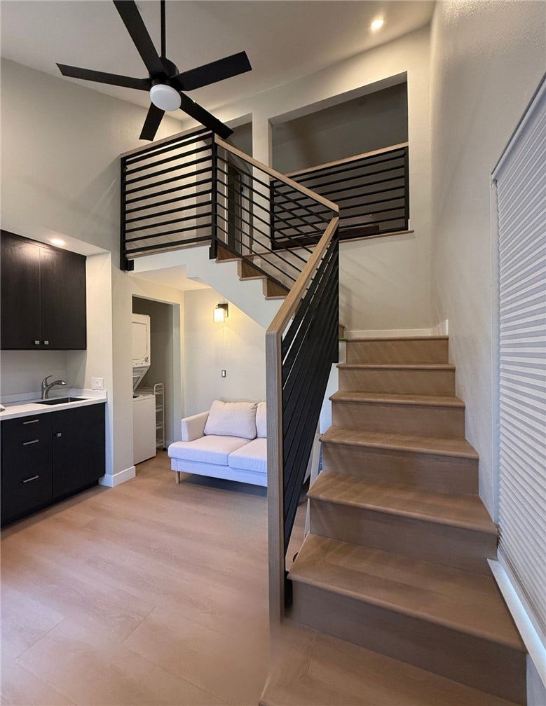Great floorplan with a staircase to loft bedroom.