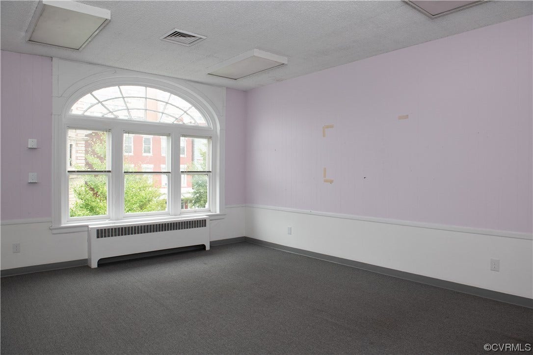 1109 & 1111 W Franklin Street, Richmond, VA 23220 1111 W. Franklin St.
Room used as an office. Note original arched palladian style window