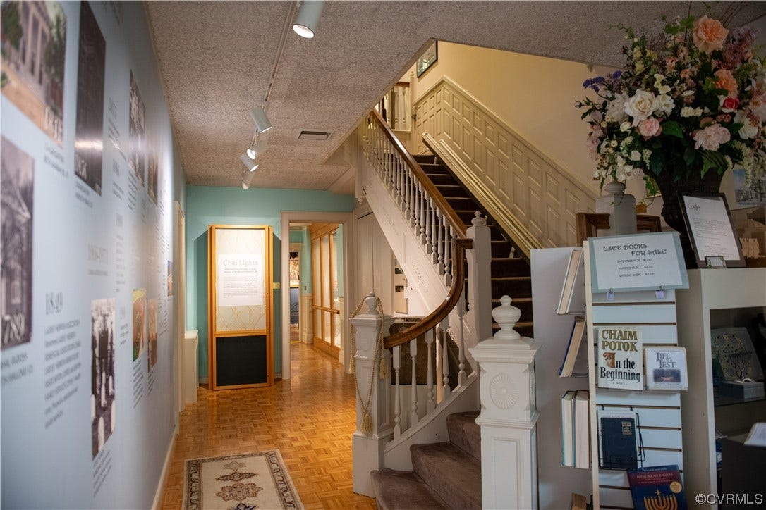 1109 & 1111 W Franklin Street, Richmond, VA 23220 Entry area of 1109 W. Franklin. Note grand staircase & raised panel wainscott.