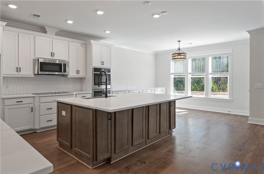 3708 Rocketts Ridge Drive, Rocketts Ridge, Sandy Hook, VA 23153 Photo represents the plan, not the actual home. Design selections may vary.