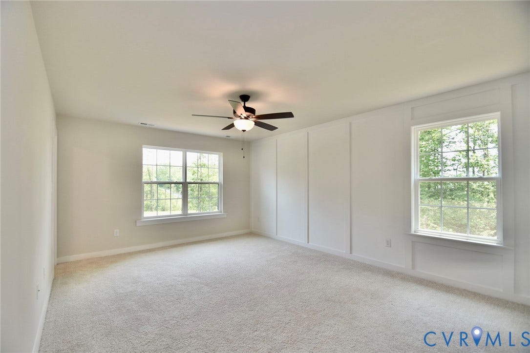 53 Porkchop Court, Louisa, VA 23093 Neutral wall finishes, recessed lighting, ceiling fan fixture, carpeted flooring, and multiple windows