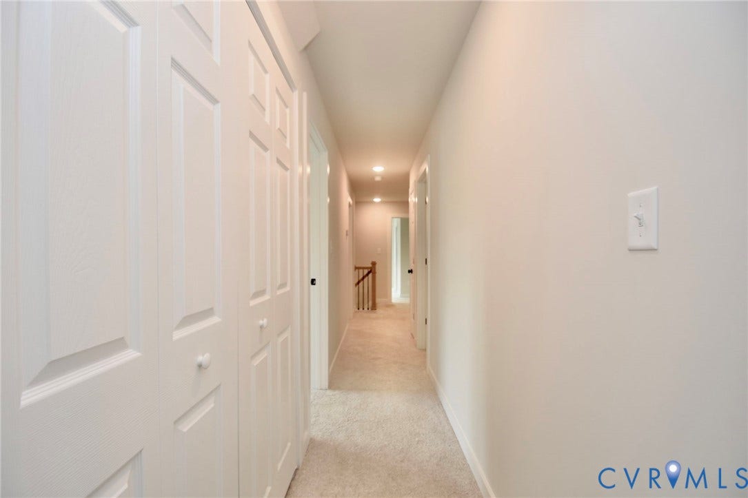 53 Porkchop Court, Louisa, VA 23093 Hallway featuring light-colored wall paint and carpet flooring