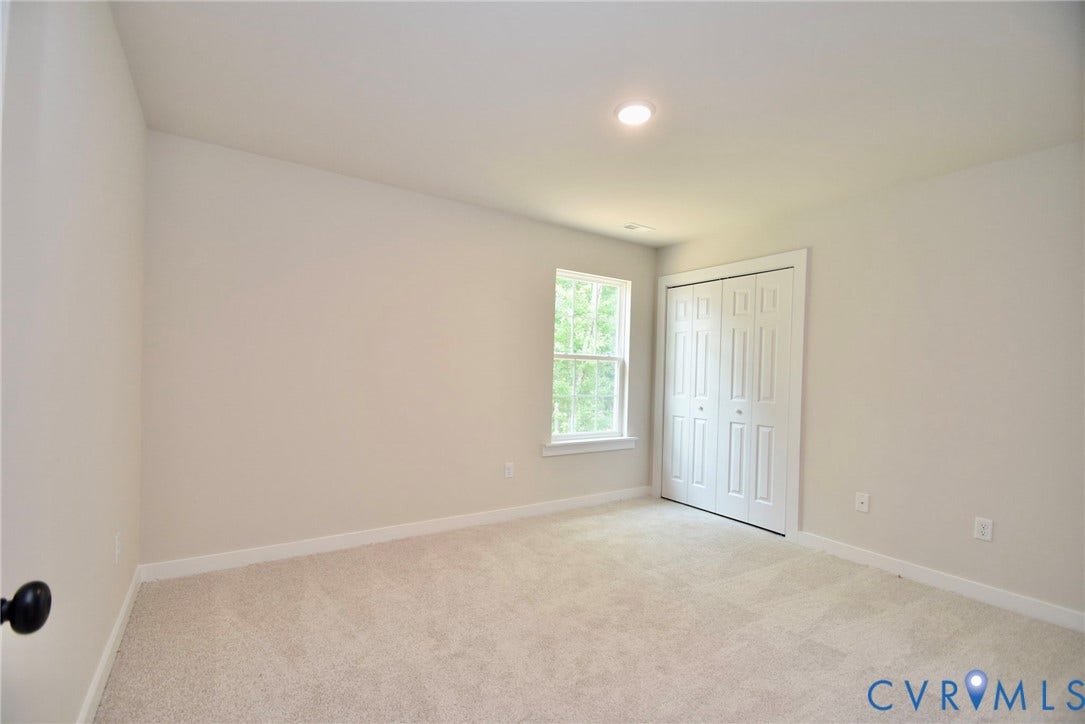 53 Porkchop Court, Louisa, VA 23093 Recessed lighting, carpet flooring, window with white trim, and bi-fold closet doors