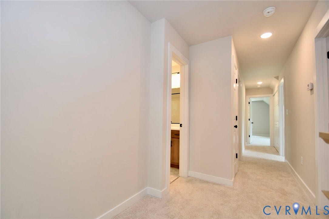 53 Porkchop Court, Louisa, VA 23093 Hallway featuring light-colored carpeting, white walls, and recessed lighting