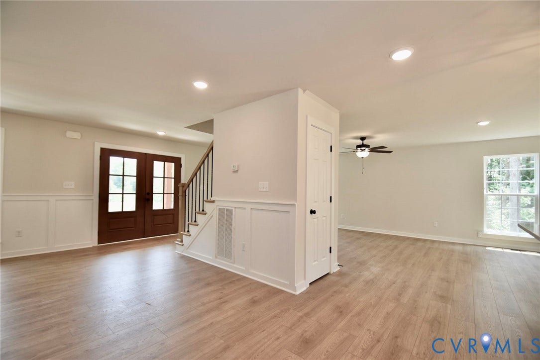 53 Porkchop Court, Louisa, VA 23093 Wood-finish flooring throughout, bright recessed lighting, and white wainscoting