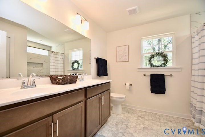 54 Porkchop Court, Louisa, VA 23093 Dual vanity with chrome fixtures and white countertop