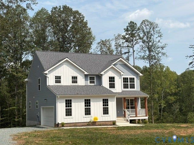 54 Porkchop Court, Louisa, VA 23093 Classic two-story colonial featuring white fiber cement siding, a covered front porch with tapered columns, and black architectural shingles