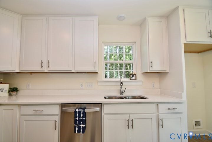 54 Porkchop Court, Louisa, VA 23093 White cabinetry, light-toned countertops, stainless steel sink, stainless steel dishwasher, and recessed lighting