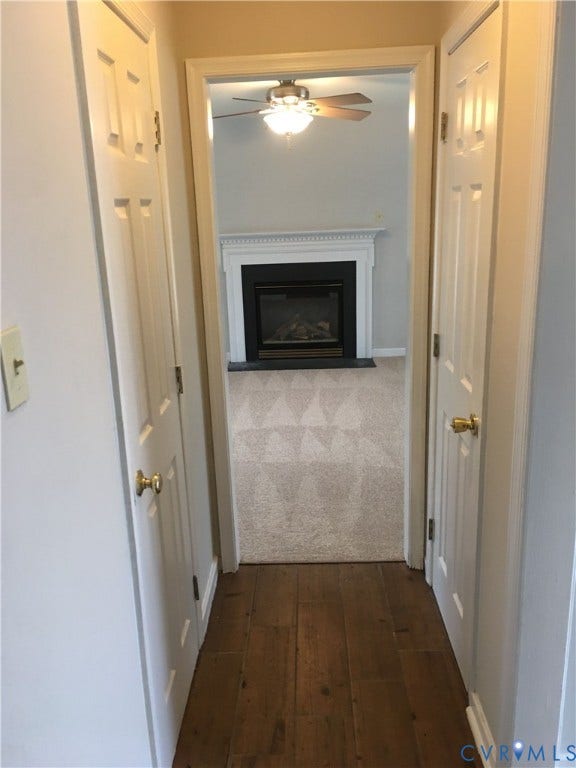 5104 Highberry Woods Road, Richmond, VA 23112 Corridor featuring dark wood-type flooring and baseboards