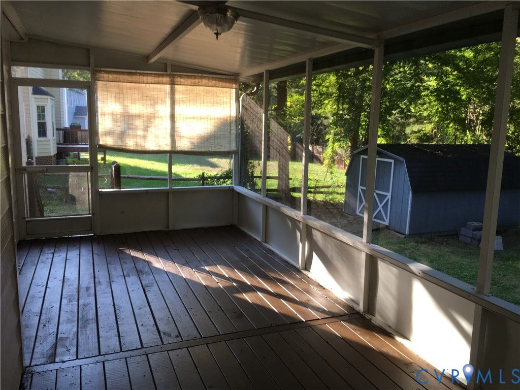 5104 Highberry Woods Road, Richmond, VA 23112 Unfurnished sunroom featuring vaulted ceiling and a wooden deck