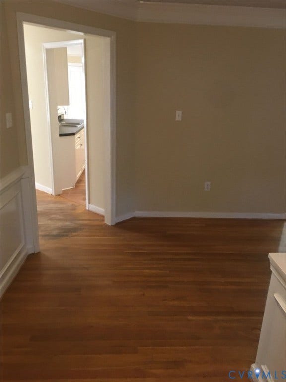 5104 Highberry Woods Road, Richmond, VA 23112 Spare room featuring dark wood finished floors and crown molding