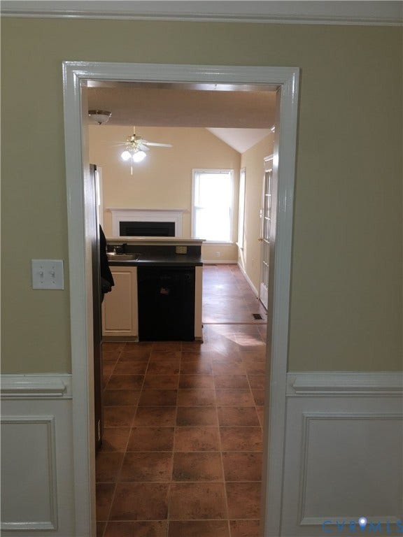 5104 Highberry Woods Road, Richmond, VA 23112 Kitchen with dishwasher, dark tile patterned floors, vaulted ceiling, and ceiling fan