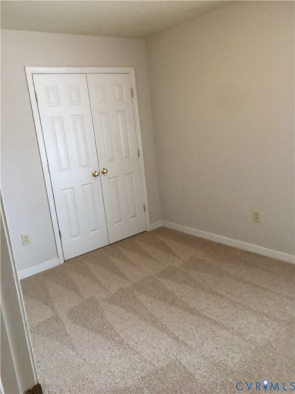 5104 Highberry Woods Road, Richmond, VA 23112 Unfurnished bedroom with light colored carpet and a closet