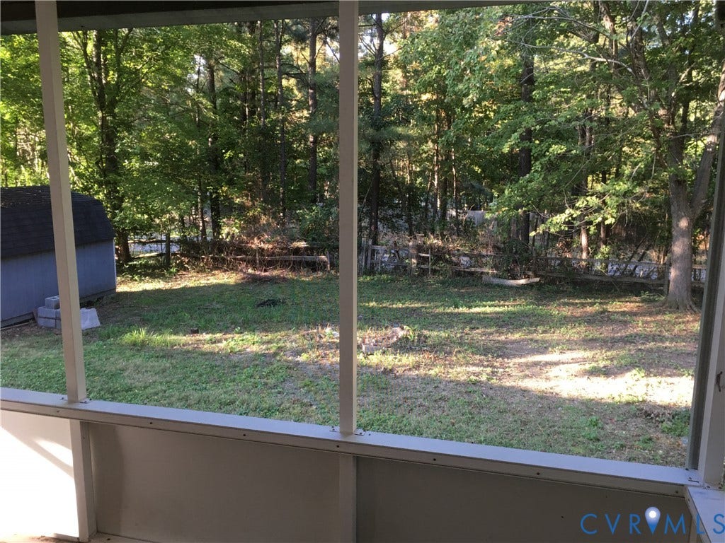 5104 Highberry Woods Road, Richmond, VA 23112 View of grassy yard featuring a storage shed