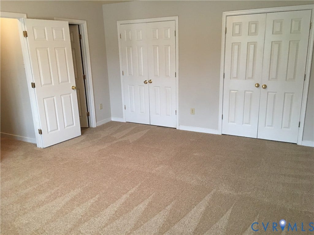 5104 Highberry Woods Road, Richmond, VA 23112 Unfurnished bedroom with light carpet and multiple closets