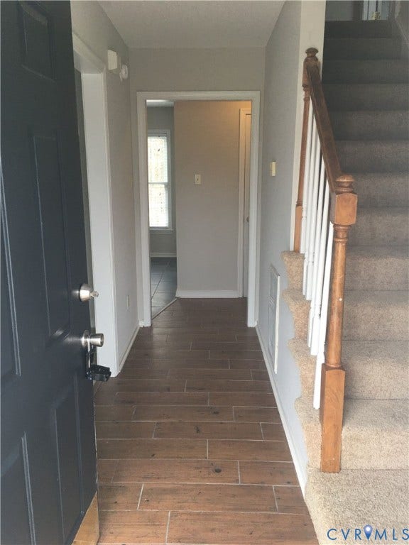 5104 Highberry Woods Road, Richmond, VA 23112 Foyer with wood tiled floors and stairs