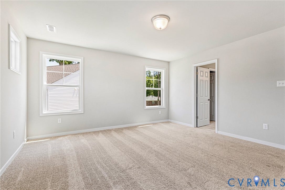 11105 Somerset Bluff Court, Somerset Hills, Glen Allen, VA 23059 Carpeted room with multiple windows and a flush-mount ceiling light