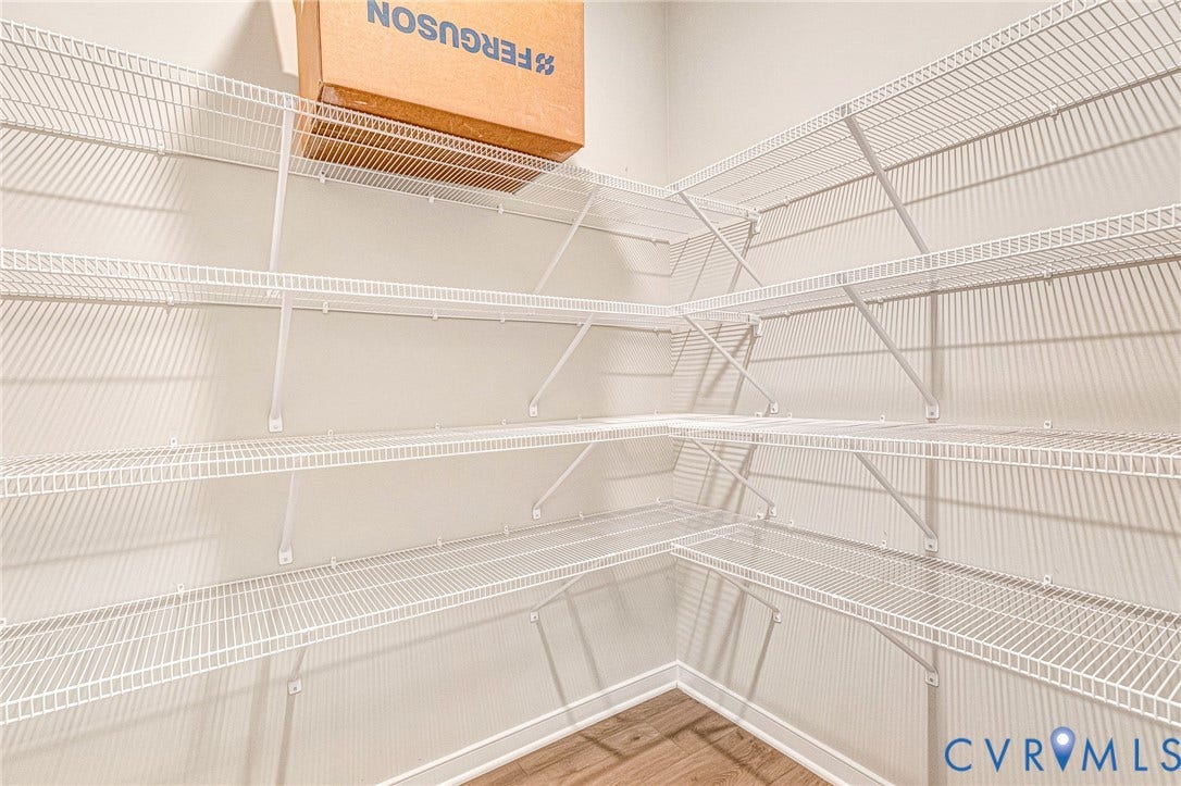 Built-in wire shelving system with multiple tiers, offering extensive storage