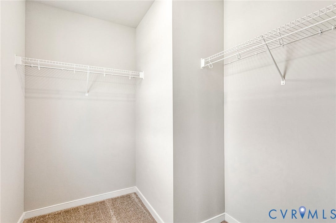 12606 Poplar Village Place, Poplar Village, Chester, VA 23831 Walk-in closet with wire shelving system and neutral carpeting