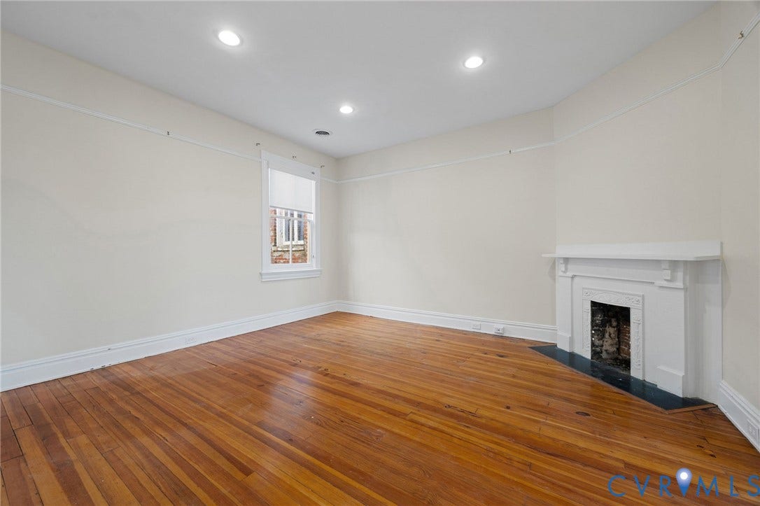 5 S Adams Street, Richmond, VA 23220 Unfurnished living room featuring hardwood / wood-style flooring, a fireplace with flush hearth, and recessed lighting
