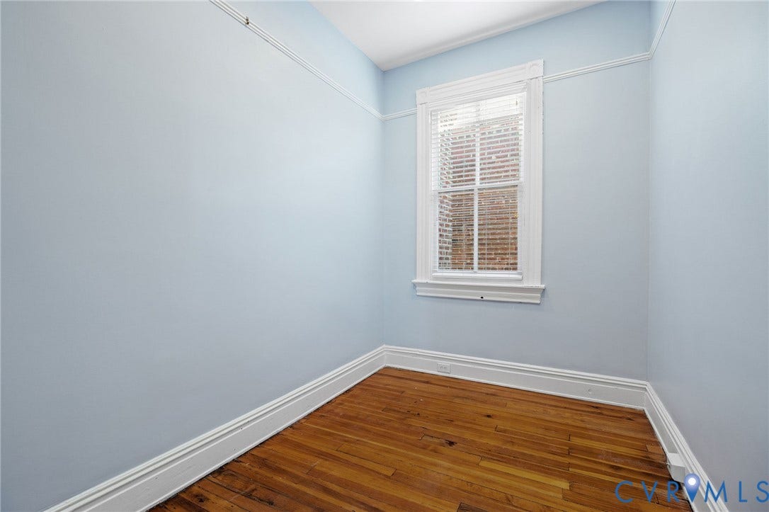 5 S Adams Street, Richmond, VA 23220 Empty room with baseboards and hardwood / wood-style floors