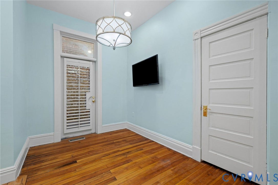 5 S Adams Street, Richmond, VA 23220 Unfurnished dining area featuring hardwood / wood-style floors and recessed lighting