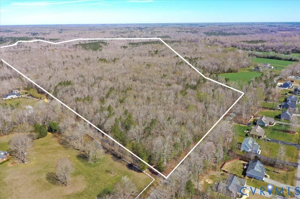 0 Tunstall Road, New Kent, VA 23124 Aerial overview of property's location featuring property parcel outlined and a forest