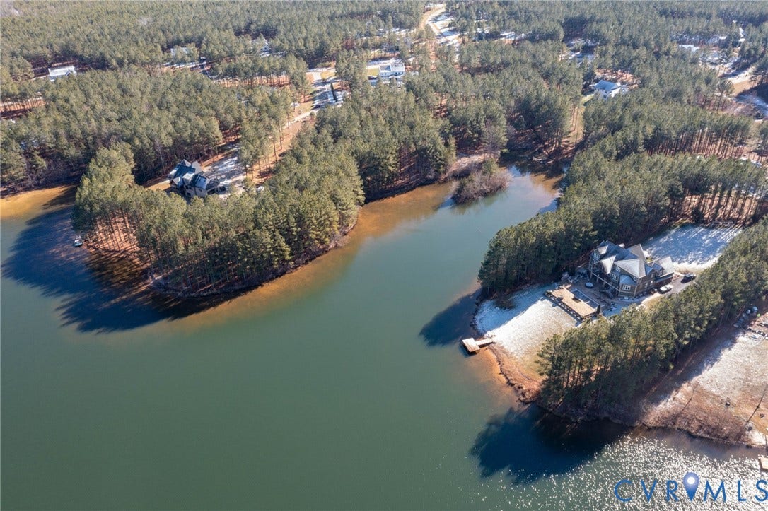 3739 Mill Mount Turn, Westlake At Mill Mount Sec2, Powhatan, VA 23139 Aerial view of property's location featuring a large body of water and a forest