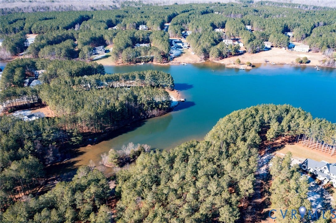 3739 Mill Mount Turn, Westlake At Mill Mount Sec2, Powhatan, VA 23139 Aerial overview of property's location featuring a forest and a large body of water
