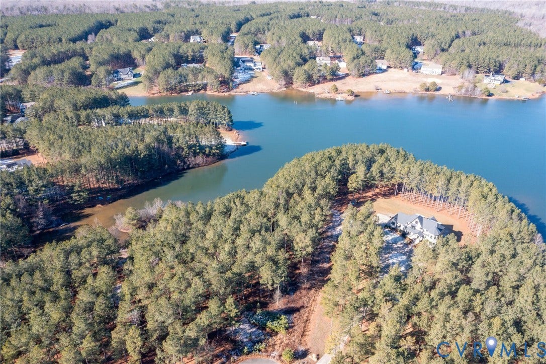 3739 Mill Mount Turn, Westlake At Mill Mount Sec2, Powhatan, VA 23139 Aerial overview of property's location featuring a large body of water and a forest