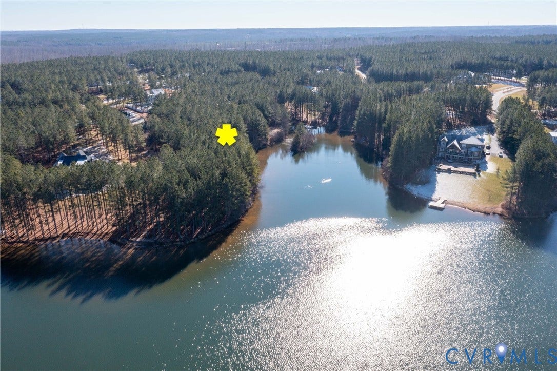 3739 Mill Mount Turn, Westlake At Mill Mount Sec2, Powhatan, VA 23139 Aerial view of property and surrounding area featuring a heavily wooded area and a nearby body of water