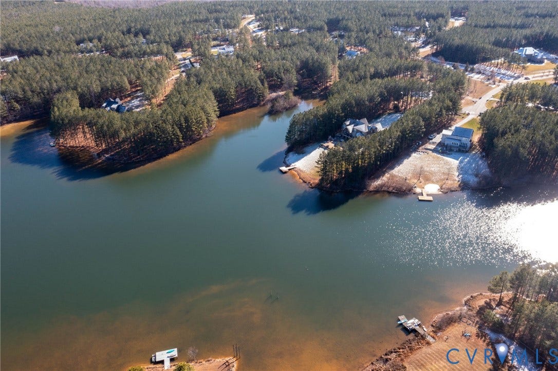 3739 Mill Mount Turn, Westlake At Mill Mount Sec2, Powhatan, VA 23139 Drone / aerial view of a nearby body of water and a heavily wooded area