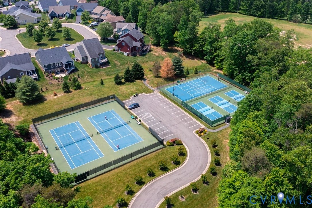 505 Bayberry Lane, Spring Creek, Zion Crossroads, VA 22942 Enjoy low-maintenance living just minutes from downtown Charlottesville in this gated community! All lawn maintenance is taken care of by the community, allowing you free time to pursue your passions and enjoy all of the amazing amenities this community has to offer: a community pool, walking/biking trails, a clubhouse, a fitness center, and sports courts, including both tennis and pickleball. Enjoy close proximity to the Spring Creek Golf Course that flows throughout the community and access to The Tavern