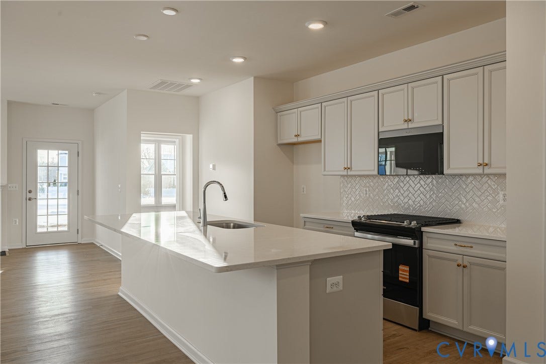 505 Bayberry Lane, Spring Creek, Zion Crossroads, VA 22942 The heart of the home is the spacious kitchen, featuring a large center island, granite countertops, stainless steel appliances, and a pantry.