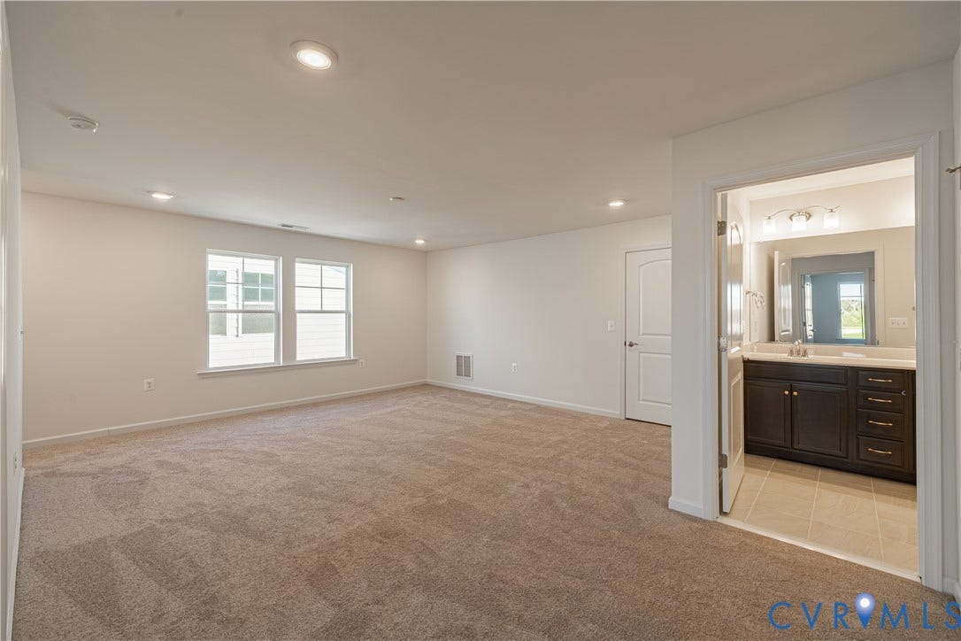 505 Bayberry Lane, Spring Creek, Zion Crossroads, VA 22942 Upstairs, you'll find a spacious loft area with carpet flooring.